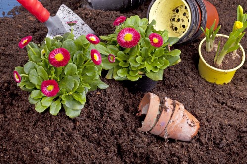 Workers and landscaping equipment representing ethical labour practices