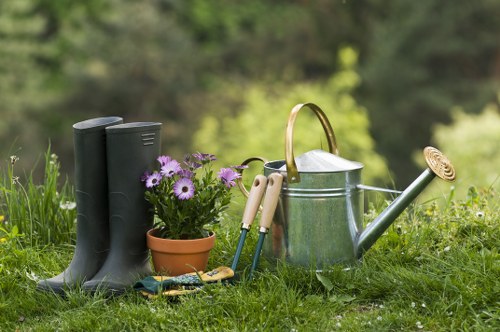 Landscapers Kingston team sorting garden waste for eco-friendly disposal