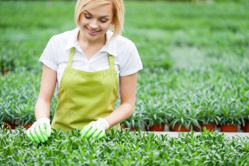 Trained staff handling garden waste with care and PPE